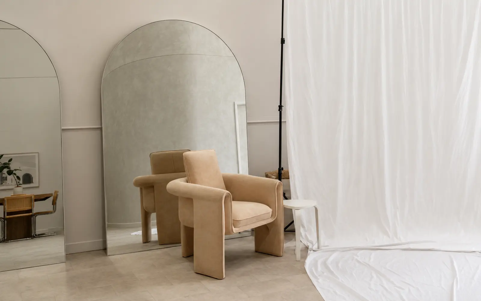 Backdrop, mirrors and lounge setting inside Birdcage Studios