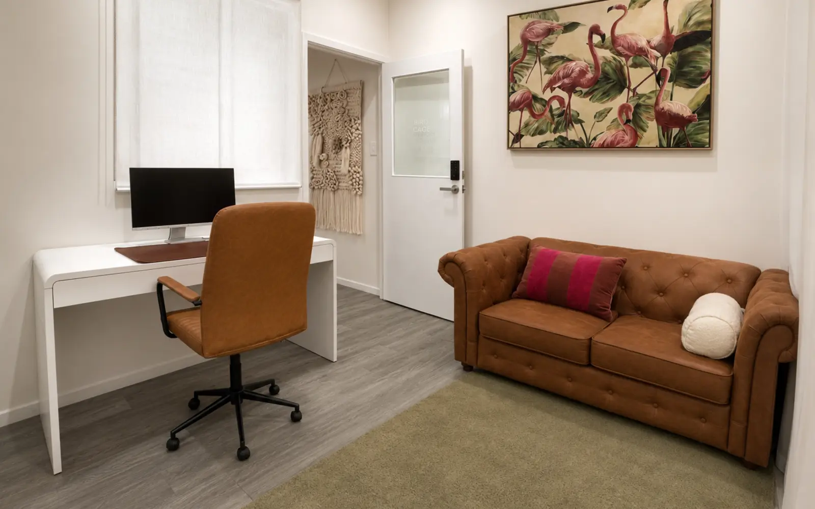 Private Hot Office at Birdcage Studios Mackay with desk and lounge